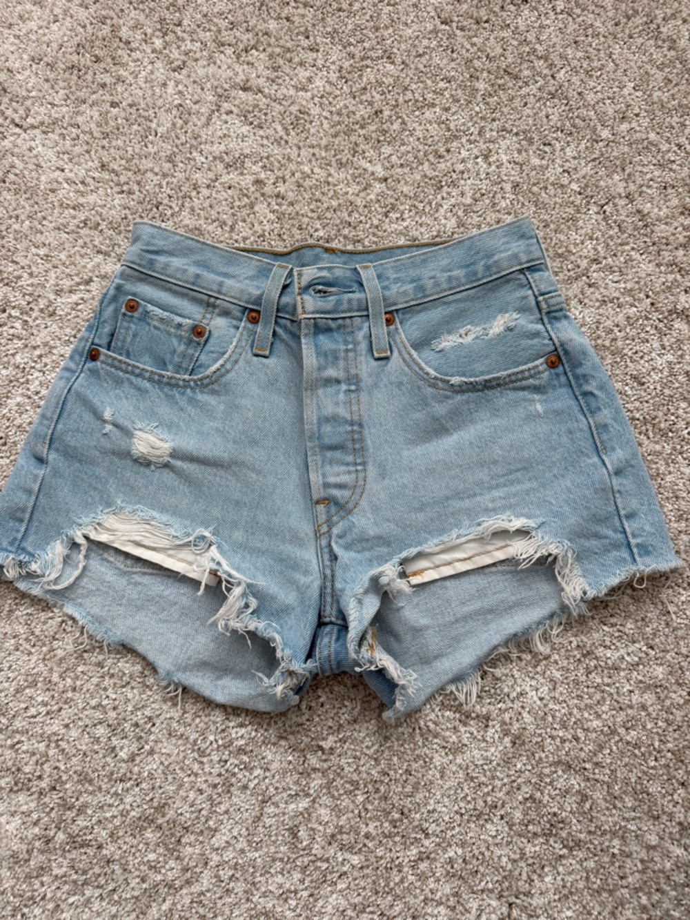 Levi’s Light Blue Distressed High-Waist Denim Shorts